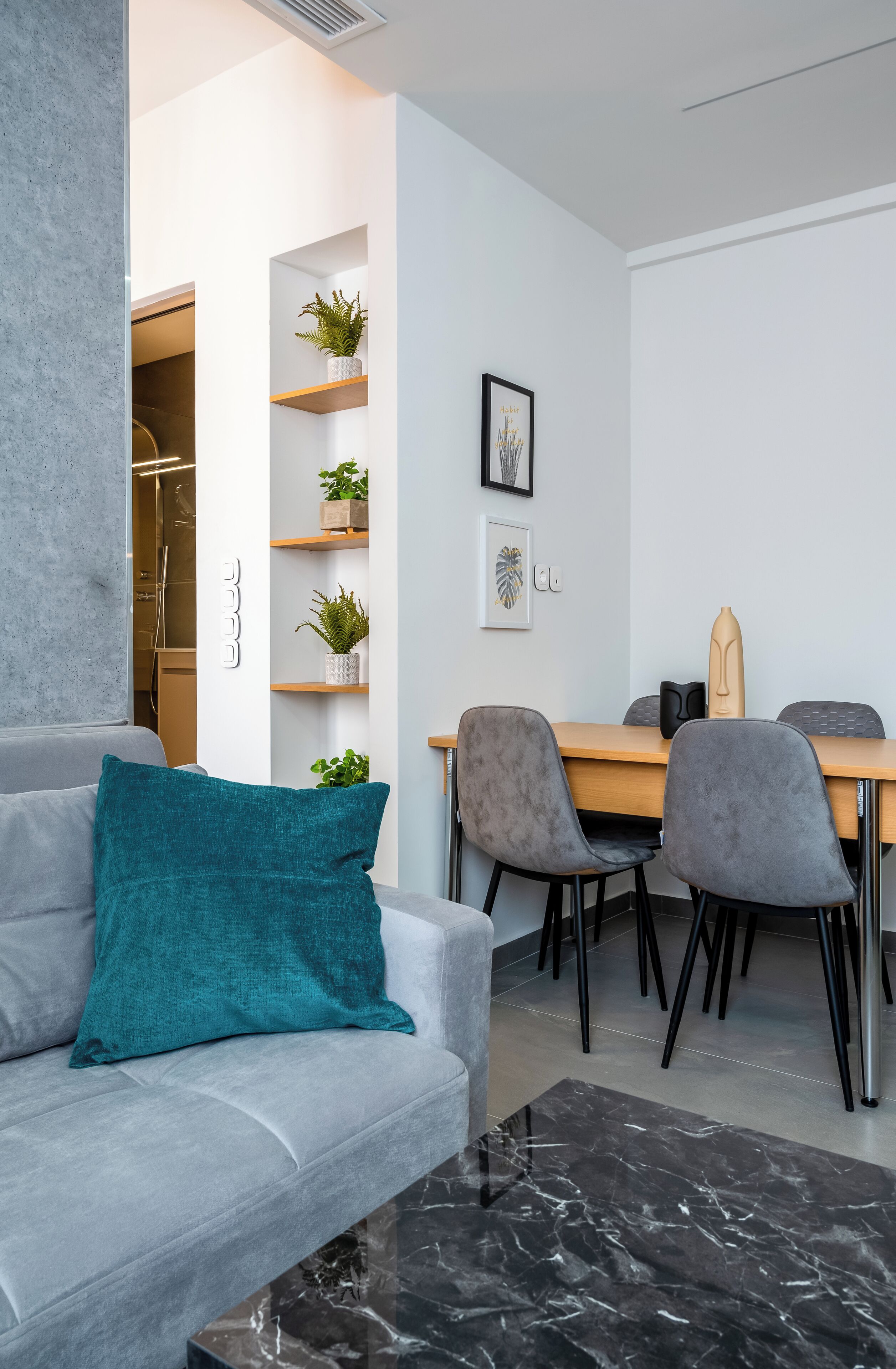 Deluxe Suite - Grey | Living area | 50-inch Smart TV with satellite channels, Netflix, streaming services