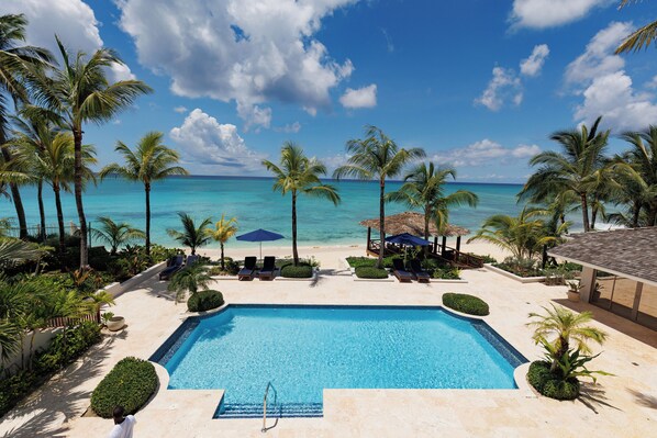 Outdoor pool, pool umbrellas, sun loungers