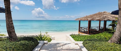 Private beach, white sand, sun-loungers, beach umbrellas