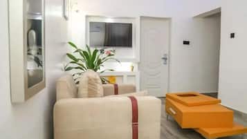 Deluxe Apartment, Balcony, City View | Living area