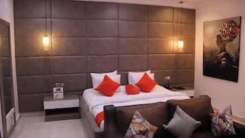 Deluxe Apartment, Balcony, City View | Desk, laptop workspace, blackout drapes, soundproofing
