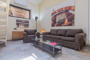 Classic Apartment, 2 Bedrooms | Living area | 30-inch TV with satellite channels