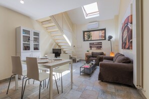 Classic Apartment, 2 Bedrooms | Living area | 30-inch TV with satellite channels