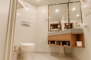 Combined shower/tub, hair dryer, towels, soap