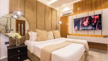 Deluxe Apartment, Balcony, City View | Desk, laptop workspace, blackout curtains, soundproofing