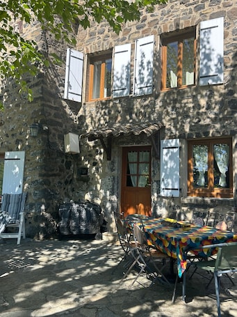 Outdoor dining. Holiday Home 'Gîte Les Bourriaux À La Ferme De' with Mountain View