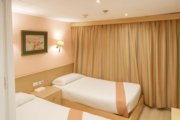In-room safe, blackout drapes, soundproofing