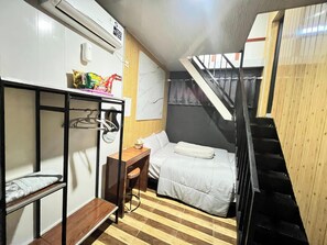 Chambre Deluxe | Bureau, espace de travail pour ordinateur portable, rideaux occultants