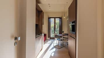 Classic Apartment, 1 Bedroom, Balcony, Courtyard View | Living area | 43-inch Smart TV with satellite channels, pay movies