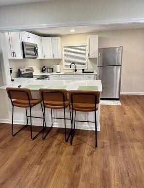 Private kitchen - Nalida's Retreat - Cozy 3 Bedroom 2 Bath w/ Modern Comforts (Talladega)