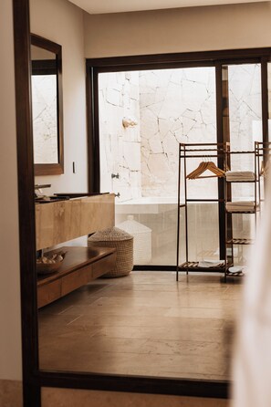 Deluxe House, Balcony, Beach View | Bathroom | Shower, rainfall showerhead, hair dryer, slippers