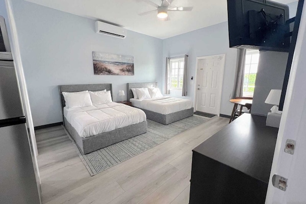 Basic Room, 2 Double Beds | Desk, laptop workspace, iron/ironing board, free WiFi