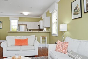 Maison, 1 très grand lit et 1 canapé-lit (Barefoot Cottage B49 - Seabbatical) | Aire de séjour