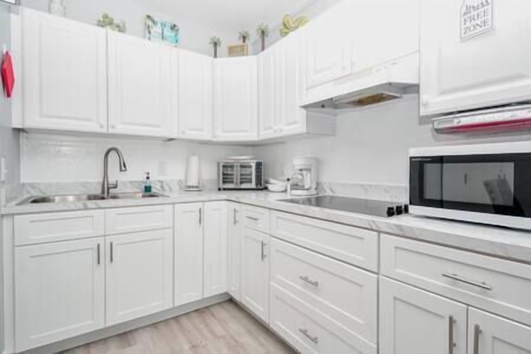 Fridge, microwave, coffee/tea maker, toaster