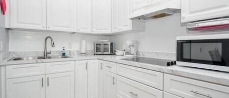 Fridge, microwave, coffee/tea maker, toaster
