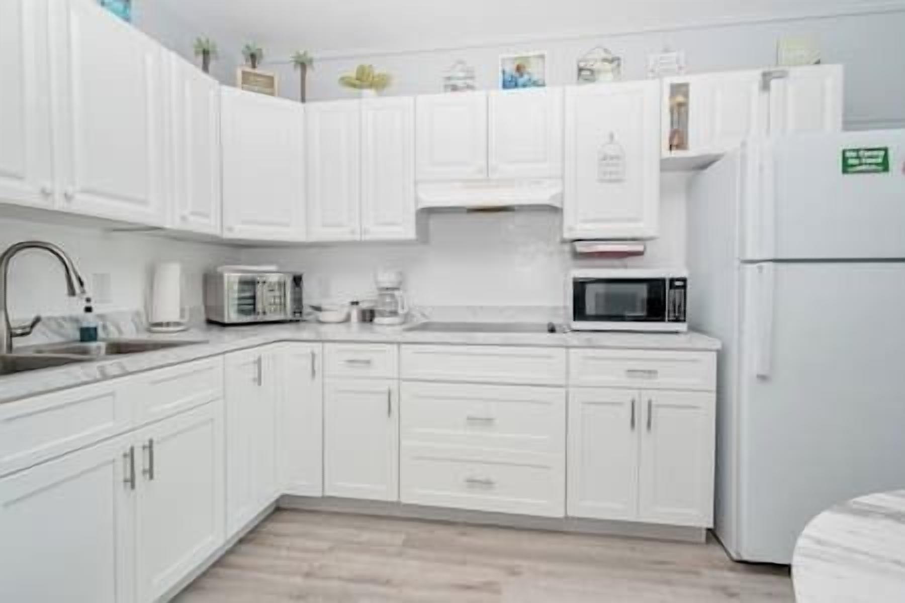 Fridge, microwave, coffee/tea maker, toaster