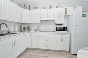 Fridge, microwave, coffee/tea maker, toaster