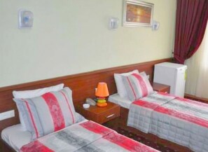 Premium bedding, desk, laptop workspace, bed sheets