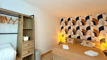 Desk, iron/ironing board, internet, bed sheets