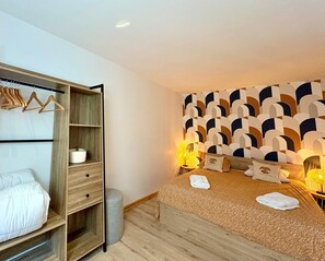 Desk, iron/ironing board, internet, bed sheets