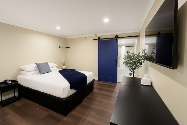 Desk, laptop workspace, free WiFi, bed sheets