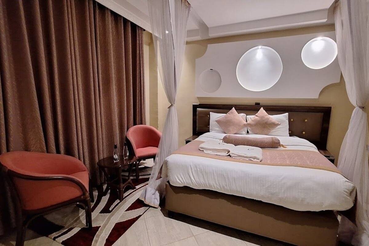 Deluxe Double Room, Garden View | WiFi (free), bed sheets