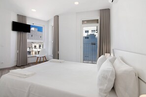 2 habitaciones, tabla de planchar con plancha, wifi y ropa de cama 