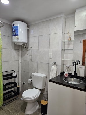 Hair dryer, towels, toilet paper
