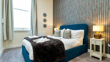 2 chambres, fer et planche Ă repasser, Wi-Fi gratuit, draps fournis