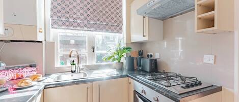 Family Apartment, Patio, City View | Private kitchen