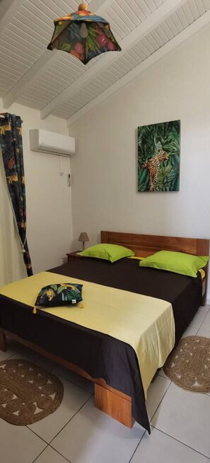 1 bedroom, desk, iron/ironing board, travel crib