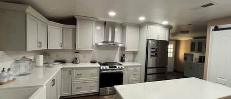 Coffee/tea maker, fridge, microwave, oven
