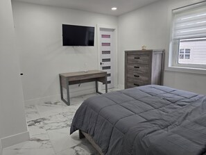 1 غرفة نوم ومكواة/لوح كي وواي فاي وملاءات أسرّة