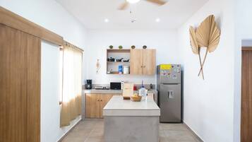 Fridge, microwave, coffee/tea maker, toaster