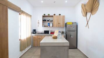 Fridge, microwave, coffee/tea maker, toaster