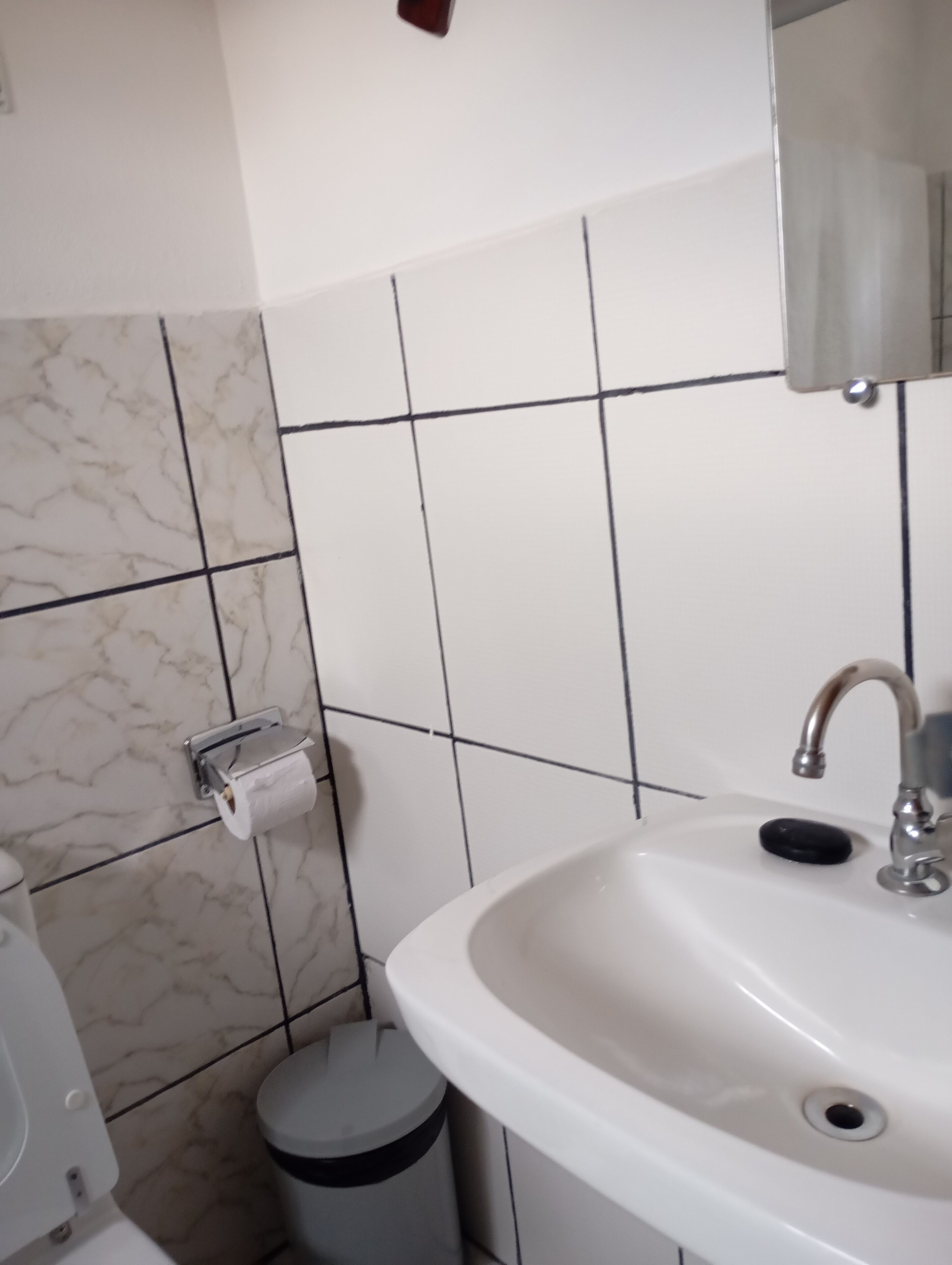 Toalhas de banho, papel higiênico