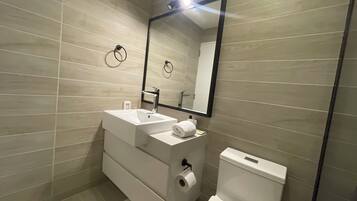 Hair dryer, towels, soap, toilet paper