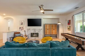 TV, fireplace, video games, table tennis - Luma House | Stylish Getaway w/ Game Room & Pool[Free Early Check-In OR Late Checkout] (Indio)