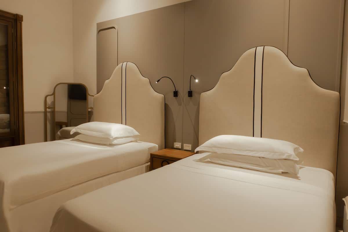 Premium bedding, down comforters, pillowtop beds, minibar