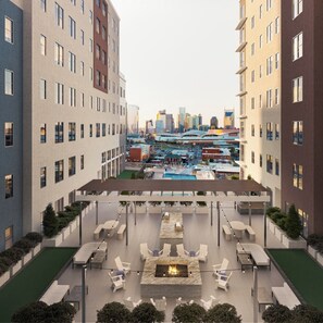 Outdoor dining - 2BR, Haven at Gulch Hotel w/ Rooftop Pool & Views (Nashville)