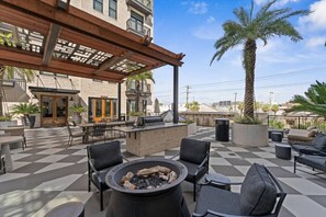 Outdoor dining - Riverside Retreat | 2BR w/ Balcony & Pool Access! (Savannah)