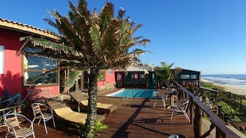 Outdoor pool, pool umbrellas, sun loungers