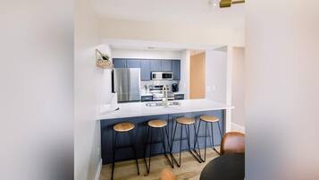 Condo, 1 King Bed with Sofa bed, Patio, Golf View (Suite Dreams) | Private kitchen | Fridge, microwave, oven, stovetop