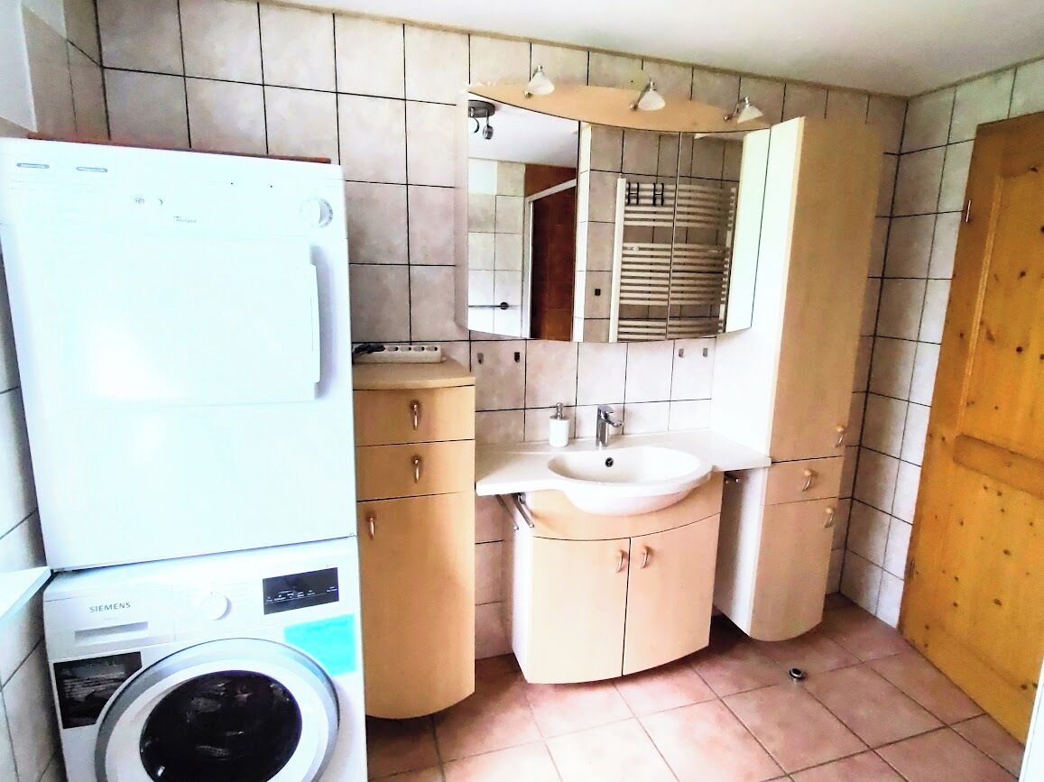 Shower, hair dryer, towels, toilet paper