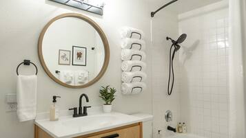 Hair dryer, towels, soap, toilet paper