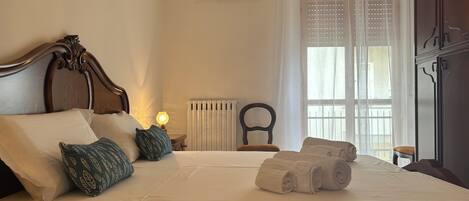 2 dormitorios, tabla de planchar con plancha, wifi y ropa de cama
