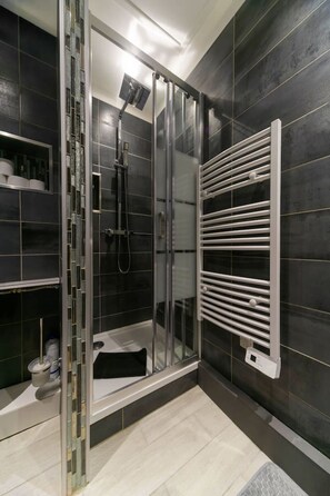 Hair dryer, towels, soap, shampoo