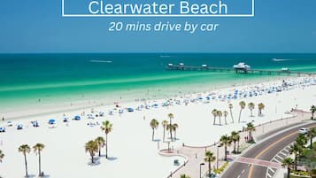 On the beach, sun loungers, beach towels