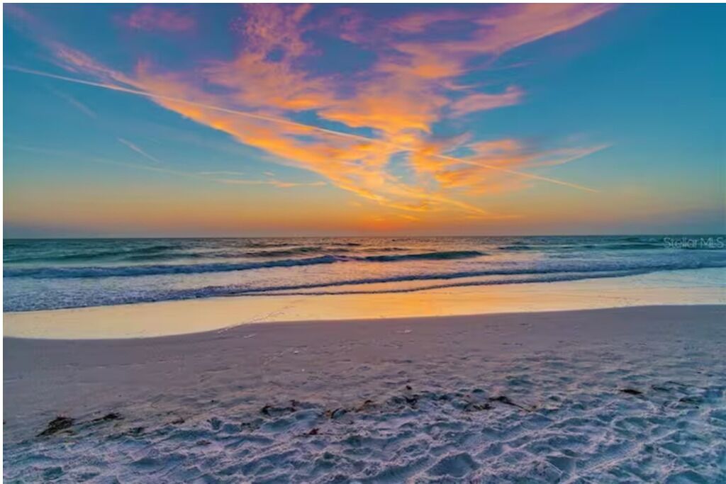On the beach, sun loungers, beach towels