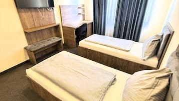 Deluxe Twin Room, Courtyard View | Desk, laptop workspace, free WiFi